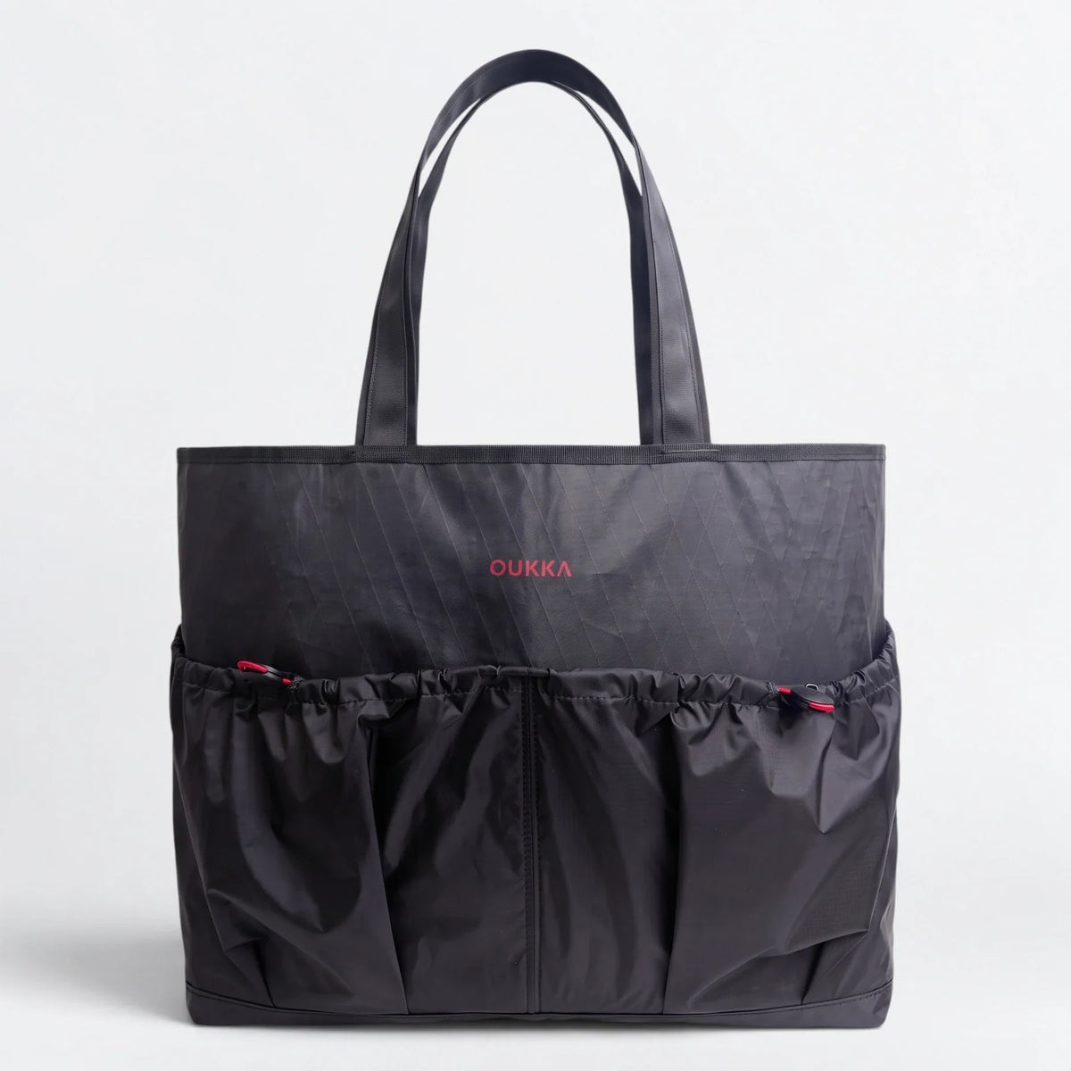 OU4232-E1 — Reversible Tote — black X-Pac face — visible X lattice