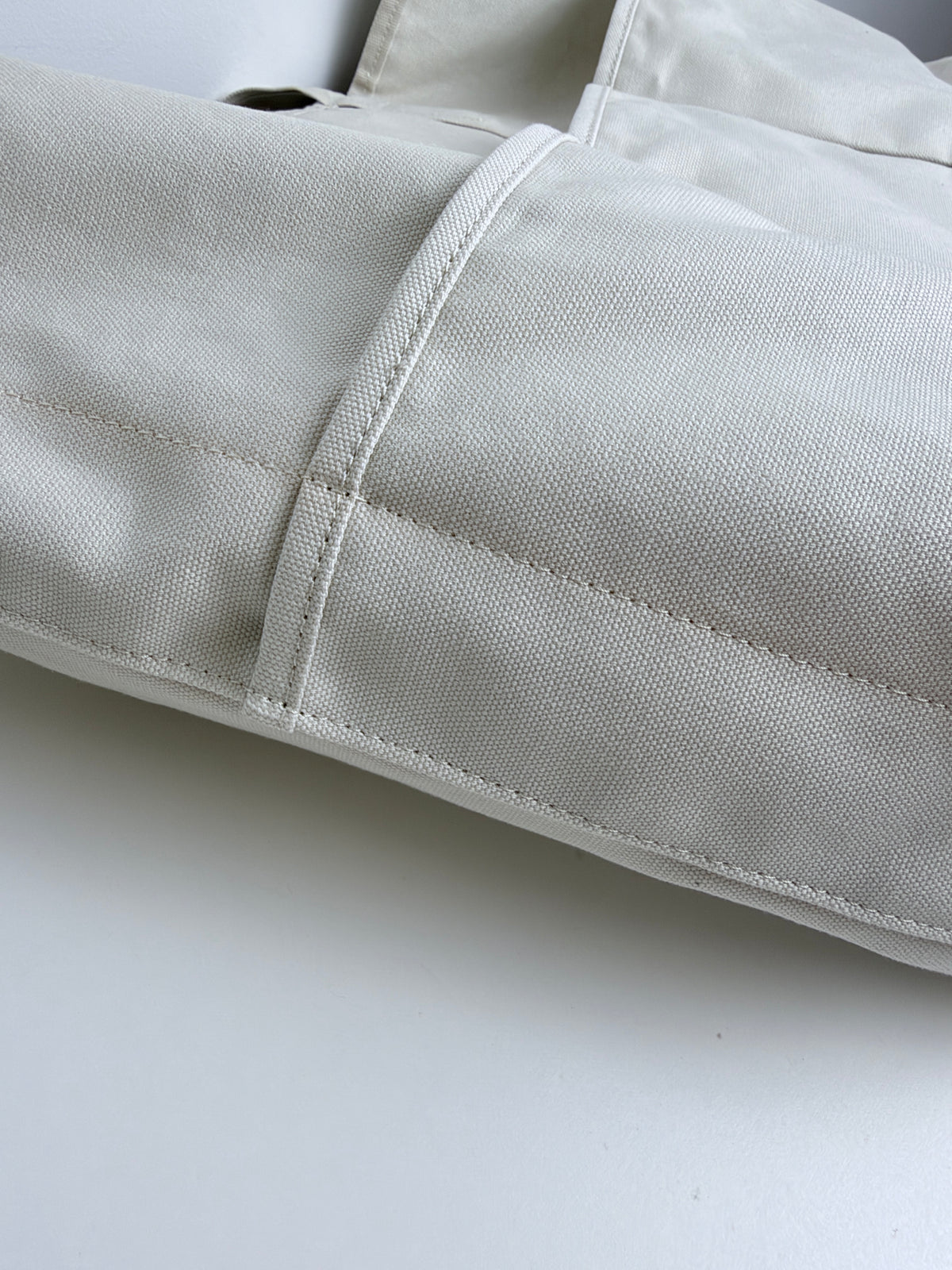 OUKKA PHASE 04 — close-up study of the canvas material