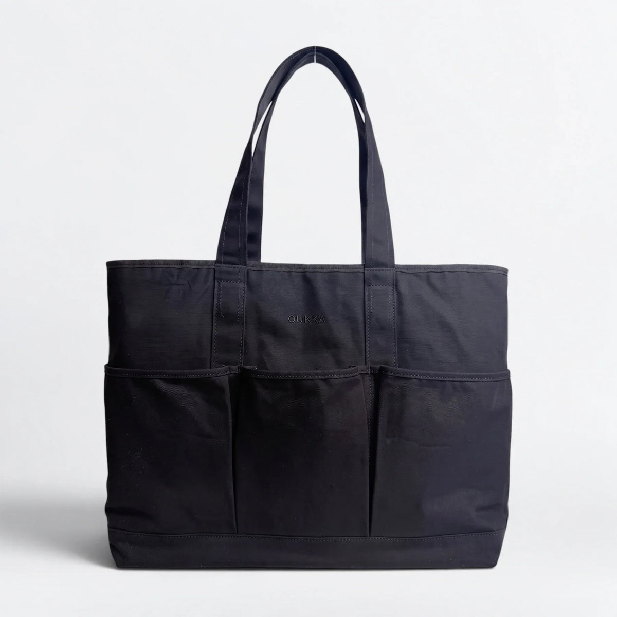 OU4232 — Reversible Tote — black Canvas face
